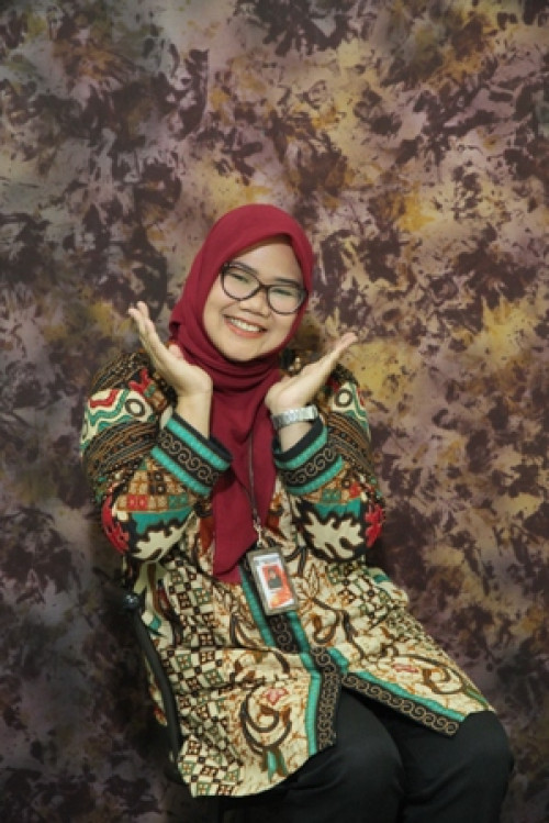 Tien Martina, S.Pd, M.Pd